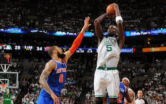 BOSTON, MA - MAY 3:  Kevin Garnett #5 of the Boston Celtics shoots the ball against Tyson Chandler #6 of the New York Knicks in Game Six of the Eastern Conference Quarterfinals during the NBA Playoffs on May 3, 2013 at the TD Garden in Boston, Massachusetts.  NOTE TO USER: User expressly acknowledges and agrees that, by downloading and or using this photograph, User is consenting to the terms and conditions of the Getty Images License Agreement. Mandatory Copyright Notice: Copyright 2013 NBAE  (Photo by Brian Babineau/NBAE via Getty Images)