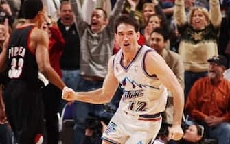 02 FEB 2002:  John Stockton #12 of the Utah Jazz takes a victory lap at the buzzer after beating the Portland Trail Blazers at the Delta Center in Salt Lake City, Utah. DIGITAL IMAGE NOTE TO USER:  User expressly acknowledges and agrees that, by downloading and/or using this Photograph, user is consenting to the terms and conditions of the Getty Images License Agreement. Mandatory Copyright Notice: Copyright 2002 NBAE. Mandatory Credit: Kent Horner/NBAE/Getty Image
