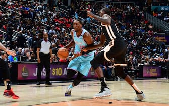 ATLANTA, GA - FEBRUARY 2020: Bam Adebayo #13 of the Miami Heat drives to the basket against the Atlanta Hawks on February 20, 2020 at State Farm Arena in Atlanta, Georgia.  NOTE TO USER: User expressly acknowledges and agrees that, by downloading and/or using this Photograph, user is consenting to the terms and conditions of the Getty Images License Agreement. Mandatory Copyright Notice: Copyright 2020 NBAE (Photo by Scott Cunningham/NBAE via Getty Images)