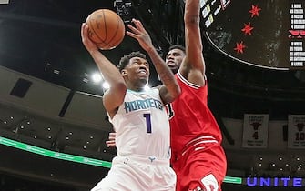 1207649515 CHICAGO, ILLINOIS - FEBRUARY 20: Malik Monk #1 of the Charlotte Hornets shoots against Thaddeus Young #21 of the Chicago Bulls at the United Center on February 20, 2020 in Chicago, Illinois. The Hornets defeated the Bulls 103-93. NOTE TO USER: User expressly acknowledges and agrees that, by downloading and or using this photograph, User is consenting to the terms and conditions of the Getty Images License Agreement. (Photo by Jonathan Daniel/Getty Images)