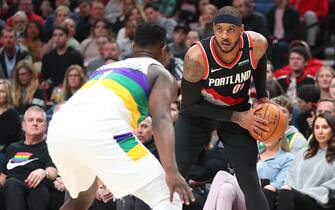 PORTLAND, OREGON - FEBRUARY 21: Carmelo Anthony #00 of the Portland Trail Blazers looks to take a shot against Zion Williamson #1 of the New Orleans Pelicans in the first quarter during their game at Moda Center on February 21, 2020 in Portland, Oregon.  NOTE TO USER: User expressly acknowledges and agrees that, by downloading and or using this photograph, User is consenting to the terms and conditions of the Getty Images License Agreement. (Photo by Abbie Parr/Getty Images)