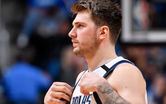 ORLANDO, FL - FEBRUARY 21: Luka Doncic #77 of the Dallas Mavericks looks on during the game against the Orlando Magic on February 21, 2020 at Amway Center in Orlando, Florida. NOTE TO USER: User expressly acknowledges and agrees that, by downloading and or using this photograph, User is consenting to the terms and conditions of the Getty Images License Agreement. Mandatory Copyright Notice: Copyright 2020 NBAE (Photo by Fernando Medina/NBAE via Getty Images)
