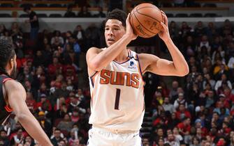 CHICAGO, IL - FEBRUARY 22: Devin Booker #1 of the Phoenix Suns handles the ball against the Chicago Bulls on February 22, 2020 at the United Center in Chicago, Illinois. NOTE TO USER: User expressly acknowledges and agrees that, by downloading and or using this photograph, user is consenting to the terms and conditions of the Getty Images License Agreement.  Mandatory Copyright Notice: Copyright 2020 NBAE (Photo by Randy Belice/NBAE via Getty Images)