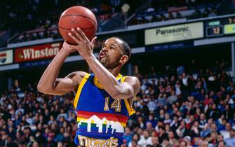 SACRAMENTO, CA - 1991:  Mike Adams #14 of the Denver Nuggets shoots the ball during a game against the Sacramento Kings circa 1991 at Arco Arena in Sacramento, California. NOTE TO USER: User expressly acknowledges and agrees that, by downloading and/or using this Photograph, user is consenting to the terms and conditions of the Getty Images License Agreement. Mandatory Copyright Notice: Copyright 1991 NBAE (Photo by Rocky Widner/NBAE via Getty Images)