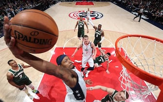 1203031400 WASHINGTON, DC -Â FEBRUARY 24: Bradley Beal #3 of the Washington Wizards dunks the ball during the game against the Milwaukee Bucks on February 24, 2020 at Capital One Arena in Washington, DC. NOTE TO USER: User expressly acknowledges and agrees that, by downloading and or using this Photograph, user is consenting to the terms and conditions of the Getty Images License Agreement. Mandatory Copyright Notice: Copyright 2020 NBAE (Photo by Stephen Gosling/NBAE via Getty Images)