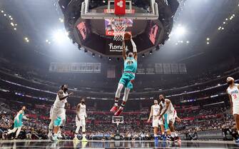 LOS ANGELES, CA - FEBRUARY 24: Ja Morant #12 of the Memphis Grizzlies drives to the basket during the game against the LA Clippers on February 24, 2020 at STAPLES Center in Los Angeles, California. NOTE TO USER: User expressly acknowledges and agrees that, by downloading and/or using this Photograph, user is consenting to the terms and conditions of the Getty Images License Agreement. Mandatory Copyright Notice: Copyright 2020 NBAE (Photo by Andrew D. Bernstein/NBAE via Getty Images) 