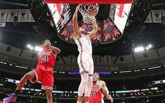 CHICAGO, ILLINOIS - FEBRUARY 25: Danilo Gallinari #8 of the Oklahoma City Thunder dunks the ball past Thaddeus Young #21 of the Chicago Bulls at the United Center on February 25, 2020 in Chicago, Illinois. The Thunder beat the Bulls 124-122. NOTE TO USER: User expressly acknowledges and agrees that, by downloading and or using this photograph, User is consenting to the terms and conditions of the Getty Images License Agreement. (Photo by Jonathan Daniel/Getty Images)