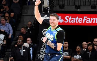 SAN ANTONIO, TX - FEBRUARY 26: Luka Doncic #77 of the Dallas Mavericks reacts to a play during the game against the San Antonio Spurs on February 26, 2020 at the AT&T Center in San Antonio, Texas. NOTE TO USER: User expressly acknowledges and agrees that, by downloading and or using this photograph, user is consenting to the terms and conditions of the Getty Images License Agreement. Mandatory Copyright Notice: Copyright 2020 NBAE (Photos by Logan Riely/NBAE via Getty Images)