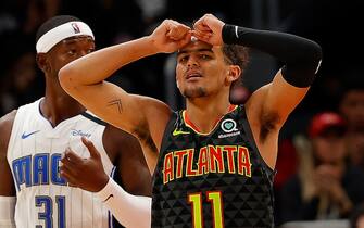 ATLANTA, GEORGIA - FEBRUARY 26:  Trae Young #11 of the Atlanta Hawks reacts in the second half against the Orlando Magic at State Farm Arena on February 26, 2020 in Atlanta, Georgia.  NOTE TO USER: User expressly acknowledges and agrees that, by downloading and/or using this photograph, user is consenting to the terms and conditions of the Getty Images License Agreement.  (Photo by Kevin C. Cox/Getty Images)