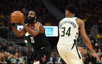 MILWAUKEE, WISCONSIN - MARCH 26:  James Harden #13 of the Houston Rockets is defended by Giannis Antetokounmpo #34 of the Milwaukee Bucks during a game at Fiserv Forum on March 26, 2019 in Milwaukee, Wisconsin. NOTE TO USER: User expressly acknowledges and agrees that, by downloading and or using this photograph, User is consenting to the terms and conditions of the Getty Images License Agreement. (Photo by Stacy Revere/Getty Images)