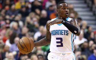 TORONTO, ON - FEBRUARY 28:  Terry Rozier #3 of the Charlotte Hornets dribbles the ball during the first half of an NBA game against the Toronto Raptors at Scotiabank Arena on February 28, 2020 in Toronto, Canada.  NOTE TO USER: User expressly acknowledges and agrees that, by downloading and or using this photograph, User is consenting to the terms and conditions of the Getty Images License Agreement.  (Photo by Vaughn Ridley/Getty Images)