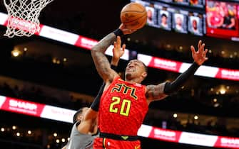 ATLANTA, GA - FEBRUARY 28: John Collins #20 of the Atlanta Hawks goes up for a shot during the first half of an NBA game against the Brooklyn Nets at State Farm Arena on February 28, 2020 in Atlanta, Georgia. NOTE TO USER: User expressly acknowledges and agrees that, by downloading and/or using this photograph, user is consenting to the terms and conditions of the Getty Images License Agreement. (Photo by Todd Kirkland/Getty Images) *** Local Caption *** John Collins