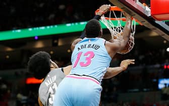 MIAMI, FLORIDA - FEBRUARY 29: Bam Adebayo #13 of the Miami Heat dunks over Jarrett Allen #31 of the Brooklyn Nets during the first half at American Airlines Arena on February 29, 2020 in Miami, Florida. NOTE TO USER: User expressly acknowledges and agrees that, by downloading and/or using this photograph, user is consenting to the terms and conditions of the Getty Images License Agreement.  (Photo by Michael Reaves/Getty Images)