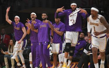 LOS ANGELES, CA - JANUARY 05: The bench celebrates after Kentavious Caldwell-Pope #1 of the Los Angeles Lakers make a three-point basket against the Detroit Pistons at Staples Center on January 5, 2020 in Los Angeles, California. NOTE TO USER: User expressly acknowledges and agrees that, by downloading and/or using this photograph, user is consenting to the terms and conditions of the Getty Images License Agreement. (Photo by John McCoy/Getty Images)