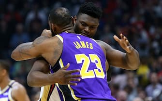 NEW ORLEANS, LOUISIANA - MARCH 01: Zion Williamson #1 of the New Orleans Pelicans as LeBron James #23 of the Los Angeles Lakers embrace before their game at the Smoothie King Center on March 01, 2020 in New Orleans, Louisiana. NOTE TO USER: User expressly acknowledges and agrees that, by downloading and or using this Photograph, user is consenting to the terms and conditions of the Getty Images License Agreement. (Photo by Jonathan Bachman/Getty Images)