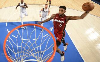 DALLAS, TX - DECEMBER 14: Derrick Jones Jr. #5 of the Miami Heat dunks the ball against the Dallas Mavericks on December 14, 2019 at the American Airlines Center in Dallas, Texas. NOTE TO USER: User expressly acknowledges and agrees that, by downloading and or using this photograph, User is consenting to the terms and conditions of the Getty Images License Agreement. Mandatory Copyright Notice: Copyright 2019 NBAE (Photo by Glenn James/NBAE via Getty Images)