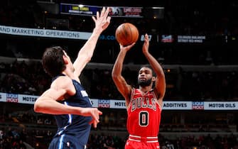 CHICAGO, IL - MARCH 2: Coby White #0 of the Chicago Bulls shoots the ball against the Dallas Mavericks on March 2, 2020 at United Center in Chicago, Illinois. NOTE TO USER: User expressly acknowledges and agrees that, by downloading and or using this photograph, User is consenting to the terms and conditions of the Getty Images License Agreement. Mandatory Copyright Notice: Copyright 2020 NBAE (Photo by Jeff Haynes/NBAE via Getty Images)