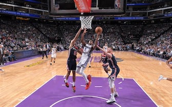SACRAMENTO, CA - MARCH 3: De'Aaron Fox #5 of the Sacramento Kings shoots the ball against the Washington Wizards on March 3, 2020 at Golden 1 Center in Sacramento, California. NOTE TO USER: User expressly acknowledges and agrees that, by downloading and or using this Photograph, user is consenting to the terms and conditions of the Getty Images License Agreement. Mandatory Copyright Notice: Copyright 2020 NBAE (Photo by Rocky Widner/NBAE via Getty Images)