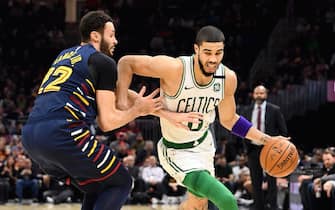 CLEVELAND, OHIO - MARCH 04: Jayson Tatum #0 of the Boston Celtics drives past Larry Nance Jr. #22 of the Cleveland Cavaliers during the second half at Rocket Mortgage Fieldhouse on March 04, 2020 in Cleveland, Ohio. The Celtics defeated the Cavaliers 112-106. NOTE TO USER: User expressly acknowledges and agrees that, by downloading and/or using this photograph, user is consenting to the terms and conditions of the Getty Images License Agreement. (Photo by Jason Miller/Getty Images)