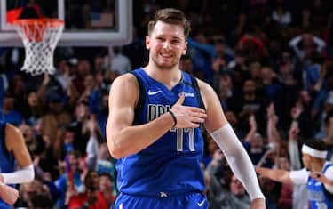 DALLAS, TX - MARCH 4: Luka Doncic #77 of the Dallas Mavericks smiles during the game against the New Orleans Pelicans on March 4, 2020 at the American Airlines Center in Dallas, Texas. NOTE TO USER: User expressly acknowledges and agrees that, by downloading and or using this photograph, User is consenting to the terms and conditions of the Getty Images License Agreement. Mandatory Copyright Notice: Copyright 2020 NBAE (Photo by Glenn James/NBAE via Getty Images)