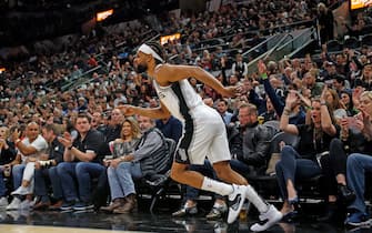 SAN ANTONIO, TX - FEBRUARY 29:  Fans reacts after Patty Mills #8 of the San Antonio Spurs hit a three against the Orlando Magic during first half action at AT&T Center on February  29, 2020 in San Antonio, Texas.  NOTE TO USER: User expressly acknowledges and agrees that , by downloading and or using this photograph, User is consenting to the terms and conditions of the Getty Images License Agreement. (Photo by Ronald Cortes/Getty Images)
