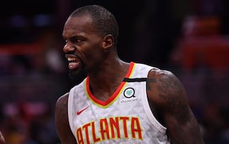 ORLANDO, FLORIDA - FEBRUARY 10: Dewayne Dedmon #14 of the Atlanta Hawks reacts after scoring in the second half against the Orlando Magic at Amway Center on February 10, 2020 in Orlando, Florida.  NOTE TO USER: User expressly acknowledges and agrees that, by downloading and/or using this photograph, user is consenting to the terms and conditions of the Getty Images License Agreement.  (Photo by Mark Brown/Getty Images)