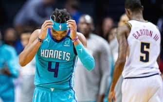 CHARLOTTE, NORTH CAROLINA - MARCH 05: Devonte' Graham #4 of the Charlotte Hornets reacts after a play during the fourth quarter during their game against the Denver Nuggets at Spectrum Center on March 05, 2020 in Charlotte, North Carolina. NOTE TO USER: User expressly acknowledges and agrees that, by downloading and/or using this photograph, user is consenting to the terms and conditions of the Getty Images License Agreement. (Photo by Jacob Kupferman/Getty Images)