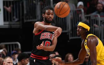 1205524598 CHICAGO, IL - March 6: Coby White #0 of the Chicago Bulls passes the ball against the Indiana Pacers on March 6, 2020 at the United Center in Chicago, Illinois. NOTE TO USER: User expressly acknowledges and agrees that, by downloading and or using this photograph, user is consenting to the terms and conditions of the Getty Images License Agreement. Mandatory Copyright Notice: Copyright 2020 NBAE (Photo by Gary Dineen/NBAE via Getty Images)