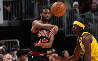 CHICAGO, IL - March 6: Coby White #0 of the Chicago Bulls passes the ball against the Indiana Pacers on March 6, 2020 at the United Center in Chicago, Illinois. NOTE TO USER: User expressly acknowledges and agrees that, by downloading and or using this photograph, user is consenting to the terms and conditions of the Getty Images License Agreement.  Mandatory Copyright Notice: Copyright 2020 NBAE (Photo by Gary Dineen/NBAE via Getty Images)