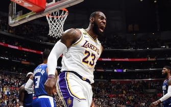 LOS ANGELES, CA - MARCH 8: LeBron James #23 of the Los Angeles Lakers reacts to a play during the game against the LA Clippers on March 8, 2020 at STAPLES Center in Los Angeles, California. NOTE TO USER: User expressly acknowledges and agrees that, by downloading and/or using this Photograph, user is consenting to the terms and conditions of the Getty Images License Agreement. Mandatory Copyright Notice: Copyright 2020 NBAE (Photo by Andrew D. Bernstein/NBAE via Getty Images) 