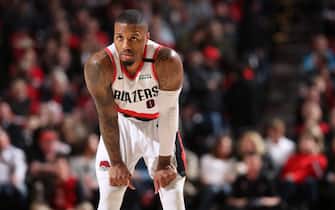 PORTLAND, OR - MARCH 7: Damian Lillard #0 of the Portland Trail Blazers looks on during the game against the Sacramento Kings on March 7, 2020 at the Moda Center Arena in Portland, Oregon. NOTE TO USER: User expressly acknowledges and agrees that, by downloading and or using this photograph, user is consenting to the terms and conditions of the Getty Images License Agreement. Mandatory Copyright Notice: Copyright 2020 NBAE (Photo by Sam Forencich/NBAE via Getty Images)