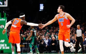 BOSTON, MASSACHUSETTS - MARCH 08: Danilo Gallinari #8 of the Oklahoma City Thunder and Dennis Schroder #17 of the Oklahoma City Thunder reacts during the fourth quarter of the game against the Boston Celtics at TD Garden on March 08, 2020 in Boston, Massachusetts. NOTE TO USER: User expressly acknowledges and agrees that, by downloading and or using this photograph, User is consenting to the terms and conditions of the Getty Images License Agreement. (Photo by Omar Rawlings/Getty Images)