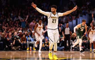 1206313029 DENVER, CO - MARCH 09: Jamal Murray #27 of the Denver Nuggets celebrates after a three pointer against the Milwaukee Bucks at Pepsi Center on March 9, 2020 in Denver, Colorado. NOTE TO USER: User expressly acknowledges and agrees that, by downloading and/or using this photograph, user is consenting to the terms and conditions of the Getty Images License Agreement (Photo by Jamie Schwaberow/Getty Images)