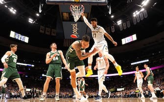 DENVER, CO - MARCH 09: Jamal Murray #27 of the Denver Nuggets dunks over D.J. Wilson #5 of the Milwaukee Bucks at Pepsi Center on March 9, 2020 in Denver, Colorado. NOTE TO USER: User expressly acknowledges and agrees that, by downloading and/or using this photograph, user is consenting to the terms and conditions of the Getty Images License Agreement (Photo by Jamie Schwaberow/Getty Images)