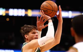 DENVER, CO - MARCH 09: Kyle Korver #26 of the Milwaukee Bucks shoots against Jamal Murray #27 of the Denver Nuggets at Pepsi Center on March 9, 2020 in Denver, Colorado. NOTE TO USER: User expressly acknowledges and agrees that, by downloading and/or using this photograph, user is consenting to the terms and conditions of the Getty Images License Agreement (Photo by Jamie Schwaberow/Getty Images)