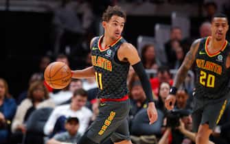 ATLANTA, GA - MARCH 09: Trae Young #11 of the Atlanta Hawks controls the ball during the first half of an NBA game against the Charlotte Hornets at State Farm Arena on March 9, 2020 in Atlanta, Georgia. NOTE TO USER: User expressly acknowledges and agrees that, by downloading and/or using this photograph, user is consenting to the terms and conditions of the Getty Images License Agreement. (Photo by Todd Kirkland/Getty Images) *** Local Caption *** Trae Young