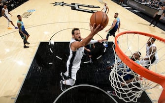 SAN ANTONIO, TX - FEBRUARY 26: Marco Belinelli #18 of the San Antonio Spurs drives to the basket against the Dallas Mavericks on February 26, 2020 at the AT&T Center in San Antonio, Texas. NOTE TO USER: User expressly acknowledges and agrees that, by downloading and or using this photograph, user is consenting to the terms and conditions of the Getty Images License Agreement. Mandatory Copyright Notice: Copyright 2020 NBAE (Photos by Logan Riely/NBAE via Getty Images)