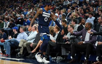 MINNEAPOLIS, MN -  MARCH 8: D'Angelo Russell #0 of the Minnesota Timberwolves high fives the coaches during the game against the New Orleans Pelicans on March 8, 2020 at Target Center in Minneapolis, Minnesota. NOTE TO USER: User expressly acknowledges and agrees that, by downloading and or using this Photograph, user is consenting to the terms and conditions of the Getty Images License Agreement. Mandatory Copyright Notice: Copyright 2020 NBAE (Photo by Jordan Johnson/NBAE via Getty Images)