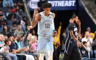 MEMPHIS, TN - MARCH 10: Ja Morant #12 of the Memphis Grizzlies reacts to a play against the Orlando Magic on March 10, 2020 at FedExForum in Memphis, Tennessee. NOTE TO USER: User expressly acknowledges and agrees that, by downloading and or using this photograph, User is consenting to the terms and conditions of the Getty Images License Agreement. Mandatory Copyright Notice: Copyright 2020 NBAE (Photo by Joe Murphy/NBAE via Getty Images)
