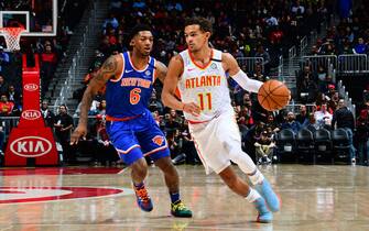 ATLANTA, GA - MARCH 11: Trae Young #11 of the Atlanta Hawks handles the ball against the New York Knicks on March 11, 2020 at State Farm Arena in Atlanta, Georgia.  NOTE TO USER: User expressly acknowledges and agrees that, by downloading and/or using this Photograph, user is consenting to the terms and conditions of the Getty Images License Agreement. Mandatory Copyright Notice: Copyright 2020 NBAE (Photo by Scott Cunningham/NBAE via Getty Images)