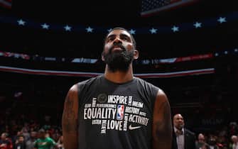 WASHINGTON, DC -¬† FEBRUARY 1: Kyrie Irving #11 of the Brooklyn Nets stands for the national anthem before the game against the Washington Wizards on February 1, 2020 at Capital One Arena in Washington, DC. NOTE TO USER: User expressly acknowledges and agrees that, by downloading and or using this Photograph, user is consenting to the terms and conditions of the Getty Images License Agreement. Mandatory Copyright Notice: Copyright 2020 NBAE (Photo by Stephen Gosling/NBAE via Getty Images)
