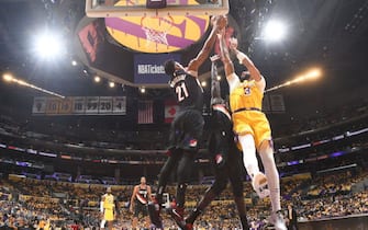 LOS ANGELES, CA - JANUARY 31: Hassan Whiteside #21 of the Portland Trail Blazers blocks the shot by Anthony Davis #3 of the Los Angeles Lakers during the game on January 31, 2020 at STAPLES Center in Los Angeles, California. NOTE TO USER: User expressly acknowledges and agrees that, by downloading and/or using this Photograph, user is consenting to the terms and conditions of the Getty Images License Agreement. Mandatory Copyright Notice: Copyright 2020 NBAE (Photo by Andrew D. Bernstein/NBAE via Getty Images)