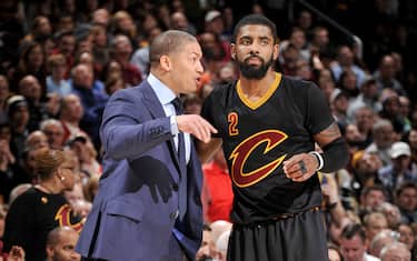 CLEVELAND, OH - DECEMBER 29:  Heac Coach Tyronn Lue of the Cleveland Cavaliers gives instructions to Kyrie Irving #2 during a game against the Boston Celtics on December 29, 2016 at Quicken Loans Arena in Cleveland, Ohio. NOTE TO USER: User expressly acknowledges and agrees that, by downloading and/or using this photograph, user is consenting to the terms and conditions of the Getty Images License Agreement. Mandatory Copyright Notice: Copyright 2016 NBAE (Photo by David Liam Kyle/NBAE via Getty Images)
