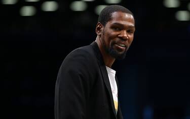 NEW YORK, NEW YORK - FEBRUARY 03: Kevin Durant #7 of the Brooklyn Nets looks on from the bench during the game Phoenix Suns at Barclays Center on February 03, 2020 in New York City.Brooklyn Nets defeated the Phoenix Suns 119-97. NOTE TO USER: User expressly acknowledges and agrees that, by downloading and or using this photograph, User is consenting to the terms and conditions of the Getty Images License Agreement. (Photo by Mike Stobe/Getty Images)