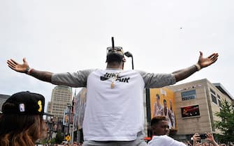 CLEVELAND, OH - JUNE 22:  LeBron James #23 of the Cleveland Cavaliers waves to the fans during the Cleveland Cavaliers Victory Parade And Rally on June 22, 2016 in downtown Cleveland, Ohio.  NOTE TO USER: User expressly acknowledges and agrees that, by downloading and/or using this Photograph, user is consenting to the terms and conditions of the Getty Images License Agreement. Mandatory Copyright Notice: Copyright 2016 NBAE  (Photo by David Liam Kyle/NBAE/Getty Images)