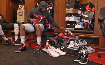 HOUSTON, TX - APRIL 29:  PJ Tucker #4 of the Houston Rockets puts on his sneakers by his locker before Game One of the Western Conference Semifinals against the Utah Jazz during the 2018 NBA Playoffs on April 29, 2018 at the Toyota Center in Houston, Texas. NOTE TO USER: User expressly acknowledges and agrees that, by downloading and/or using this photograph, user is consenting to the terms and conditions of the Getty Images License Agreement. Mandatory Copyright Notice: Copyright 2018 NBAE (Photo by Bill Baptist/NBAE via Getty Images)