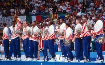BARCELONA, SPAIN- AUGUST 8: The United States stands on the podium following the Gold Medal Basketball game between the United States and Croatia at the 1992 Olympics on August 8 1992 at the Palau Municipal d'Esports de badalona in Barcelona, Spain. The United States defeated Croatia 117-85 to win the gold medal. NOTE TO USER: User expressly acknowledges and agrees that, by downloading and or using this photograph, User is consenting to the terms and conditions of the Getty Images License Agreement. Mandatory Copyright Notice: Copyright 1992 NBAE (Photo by Andrew D. Bernstein/NBAE via Getty Images)