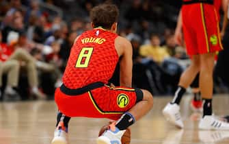 ATLANTA, GEORGIA - JANUARY 26:  Trae Young #11 of the Atlanta Hawks holds the ball for an eight second violation after tip-off in memory of Kobe Bryant during the game against the Washington Wizards at State Farm Arena on January 26, 2020 in Atlanta, Georgia.  NOTE TO USER: User expressly acknowledges and agrees that, by downloading and/or using this photograph, user is consenting to the terms and conditions of the Getty Images License Agreement.  (Photo by Kevin C. Cox/Getty Images)