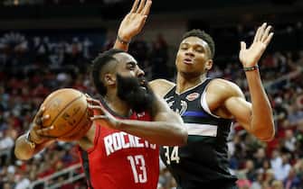 HOUSTON, TX - OCTOBER 24:  James Harden #13 of the Houston Rockets drives to the basket defended by Giannis Antetokounmpo #34 of the Milwaukee Bucks in the second half at Toyota Center on October 24, 2019 in Houston, Texas.  NOTE TO USER: User expressly acknowledges and agrees that, by downloading and or using this photograph, User is consenting to the terms and conditions of the Getty Images License Agreement.  (Photo by Tim Warner/Getty Images)