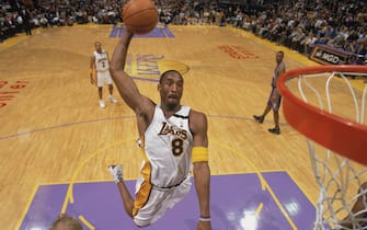LOS ANGELES - JANUARY 5:  Kobe Bryant #8 of the Los Angeles Lakers goes up for the dunk during the game against the Phoenix Suns at Staples Center on January 5, 2003 in Los Angeles, California.  The Lakers defeated the Suns 109-97.  NOTE TO USER: User expressly acknowledges and agrees that, by downloading and/or using this Photograph, User is consenting to the terms and conditions of the Getty Images License Agreement. (Photo by:  Andrew D. Bernstein/NBAE via Getty Images) 